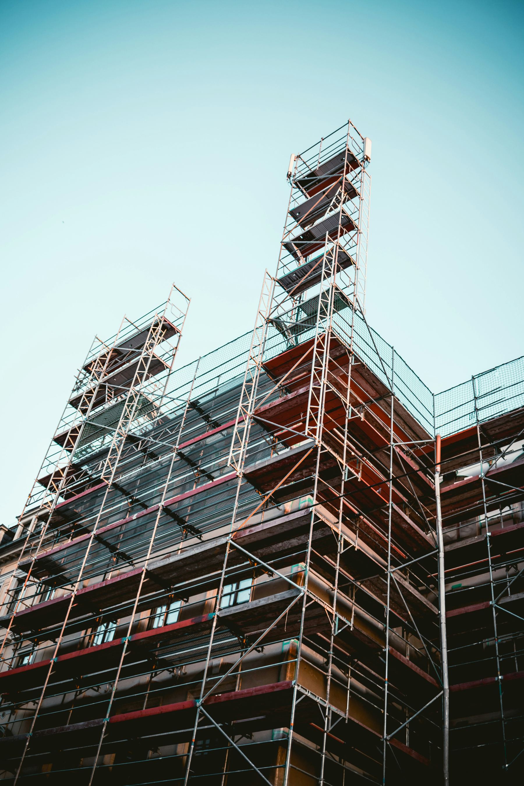 Scaffolding erected against a building facade for a condition assessment