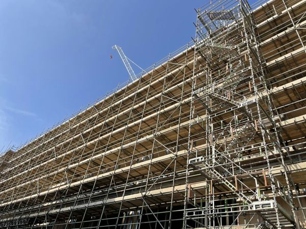 Scaffolding erected up the full height of a building for parapet and facade work